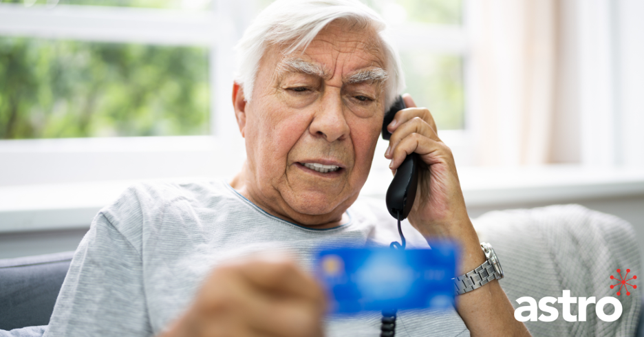 Older man falling victim to a telephone scam